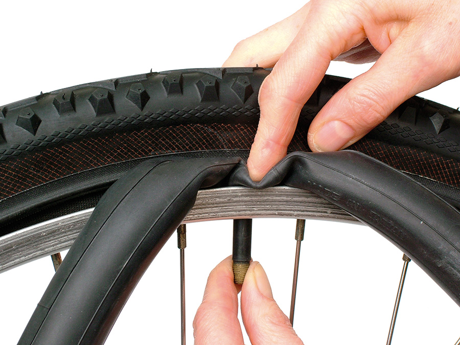 Changing a tyre on sale on a bike